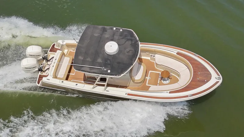 Slide: The Image of 2016 Chris-Craft Catalina 29 boat on trailer, side view, with Mercury engines. - 3