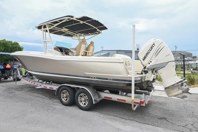 Slide: The Image of 2016 Chris-Craft Catalina 29 boat on trailer with Mercury outboard engine. - 9