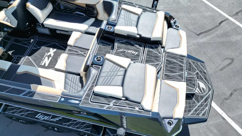 Slide: The Image of 2025 Tigé Ultré 23ZX boat interior with luxurious seating and modern design. - 12