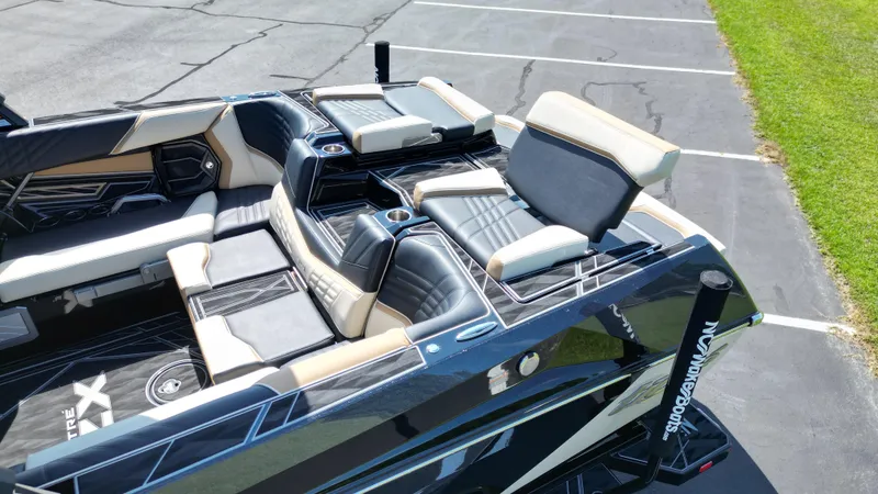 Slide: The Image of 2025 Tigé Ultré 23ZX boat interior with luxurious seating and modern design. - 16
