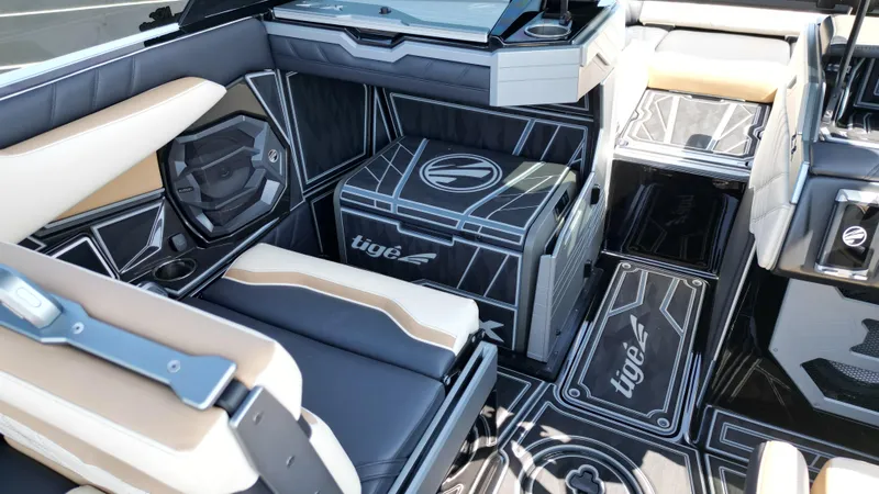 Slide: The Image of Interior of 2025 Tigé Ultré 23ZX boat, featuring sleek seating and modern design elements. - 17