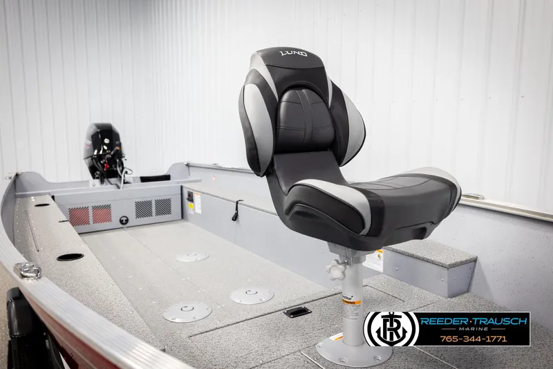 Slide: The Image of 2026 Lund 1600 Fury Tiller boat interior with swivel seat and motor, Reeder-Trausch Marine. - 26