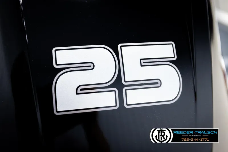 Slide: The Image of Close-up of '25' decal on 2026 Lund 1600 Fury Tiller boat. - 30