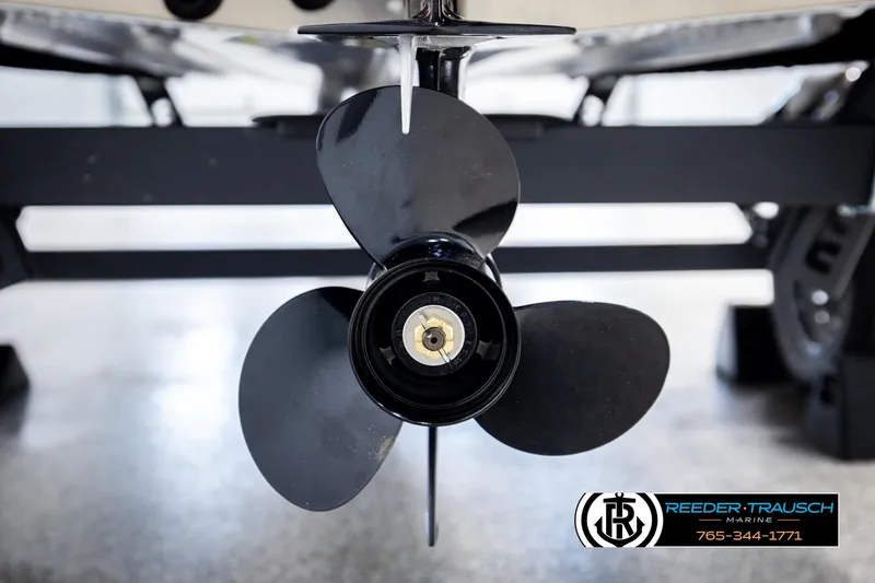 Slide: The Image of Close-up of a Lund 1600 Fury Tiller 2026 boat propeller. - 31