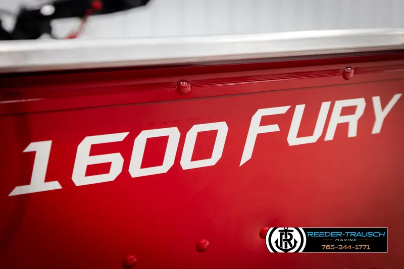 Slide: The Image of Red 2026 Lund 1600 Fury Tiller boat with Reeder-Trausch Marine logo. - 36