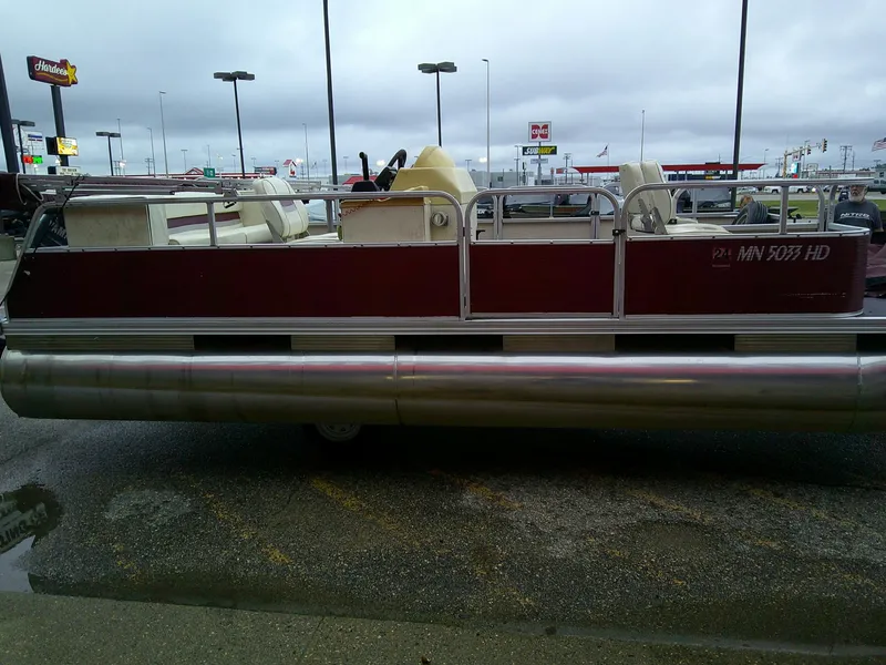 Slide: The Image of Red Misty Harbor 2020 EF pontoon boat parked in a lot, overcast sky. - 11