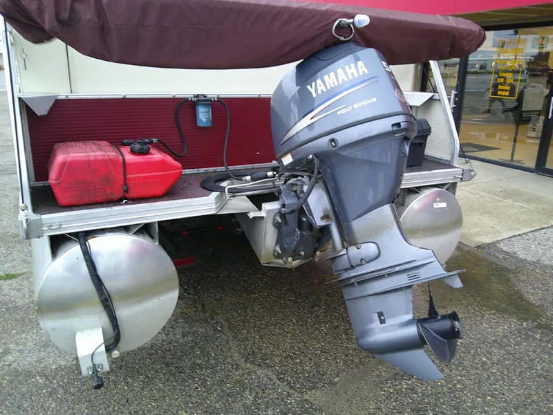 Slide: The Image of Pontoon boat with Yamaha outboard motor and red fuel tank, Misty Harbor 2020 EF model. - 3