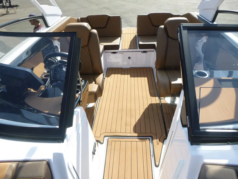 Slide: The Image of 2025 Yamaha Boats 222SD interior with luxurious seating and sleek design. - 6