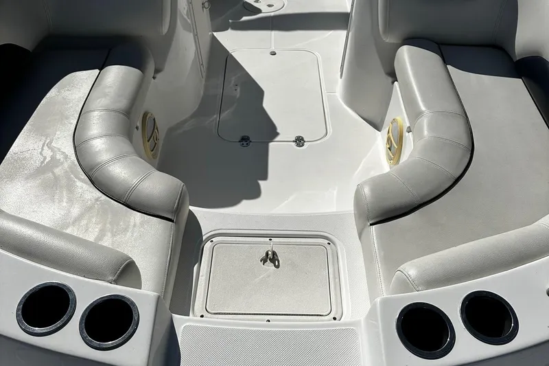 Slide: The Image of 2014 Godfrey Hurricane 188SDS Sport boat interior with cushioned seating and cup holders. - 12