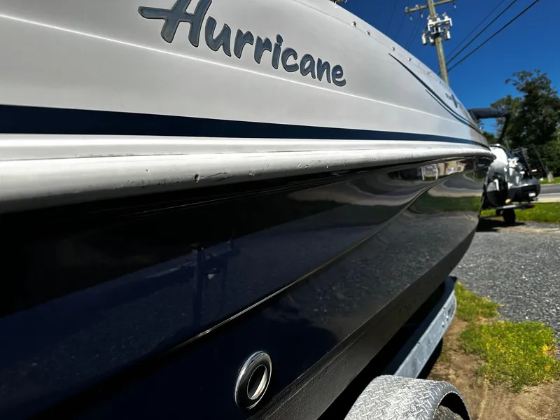 Slide: The Image of 2014 Godfrey Hurricane 188SDS Sport boat, close-up side view, parked on a trailer. - 5