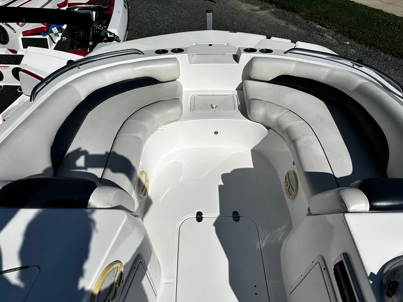 Slide: The Image of 2014 Godfrey Hurricane 188SDS Sport boat interior with white cushioned seating. - 6