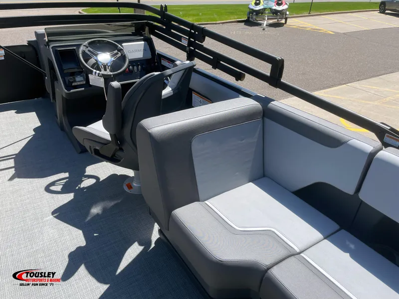 Slide: The Image of 2025 Manitou Cruise 20 MAX Bench Twin Tube interior with steering console and seating. - 4