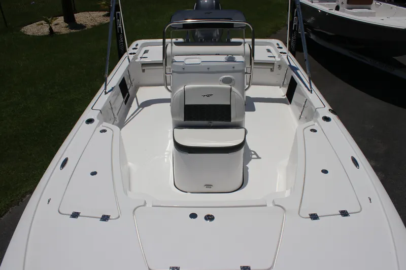 Slide: The Image of 2026 Tidewater 1910 Bay Max boat interior with seating and storage compartments. - 15