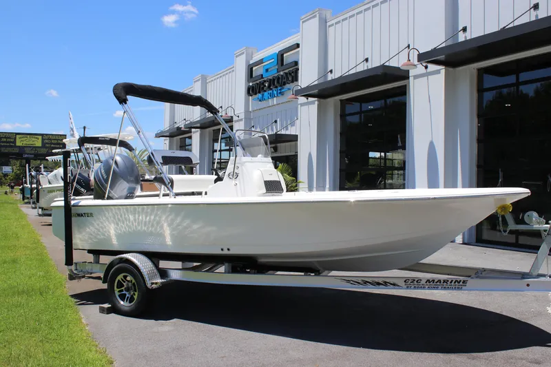 Slide: The Image of 2026 Tidewater 1910 Bay Max boat on trailer outside dealership. - 4