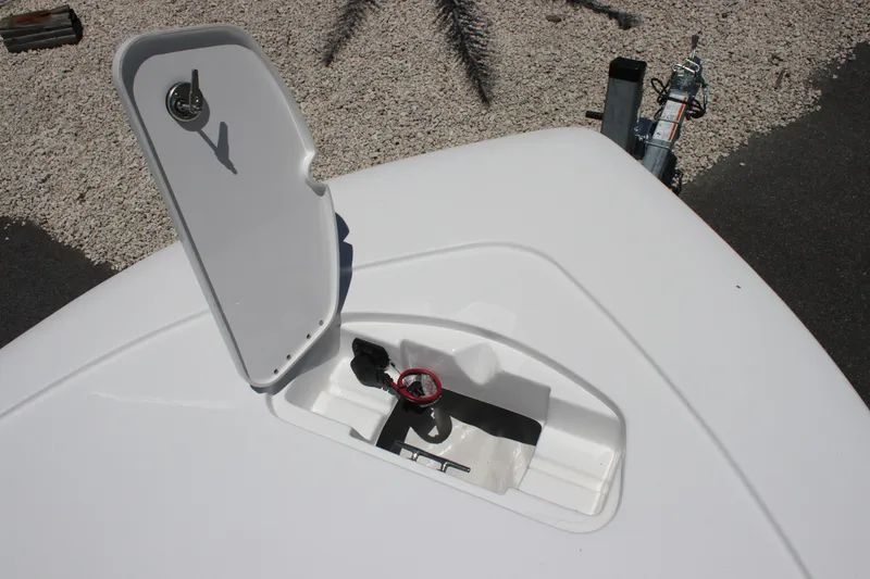 Slide: The Image of Open storage compartment on 2026 Tidewater 1910 Bay Max boat, showing interior details. - 8