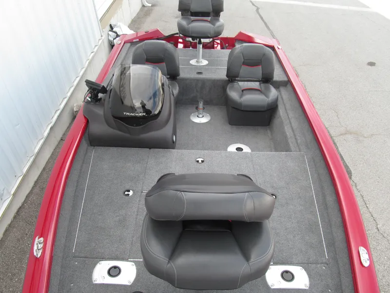 Slide: The Image of 2023 Tracker Pro Team 175 TF boat interior with seating and console. - 10