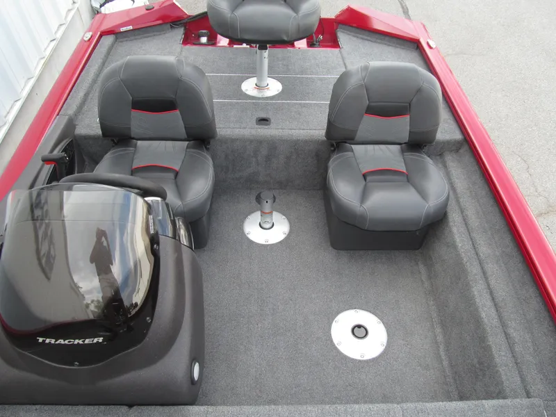 Slide: The Image of 2023 Tracker Pro Team 175 TF boat interior with gray seating and red accents. - 11