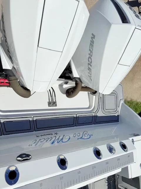 Slide: The Image of 2022 Blackfin 252 CC boat interior with sleek seating and modern design. - 5