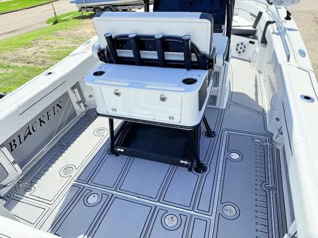 Slide: The Image of 2022 Blackfin 252 CC boat with dual Mercury engines and spacious deck. - 6