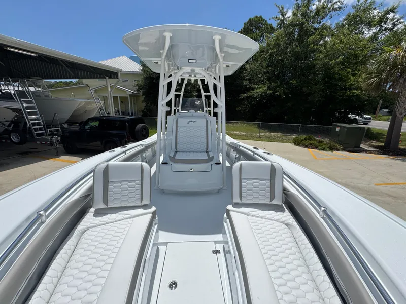 Slide: The Image of 2026 Yellowfin 26 Hybrid boat with sleek design and luxurious seating. - 22