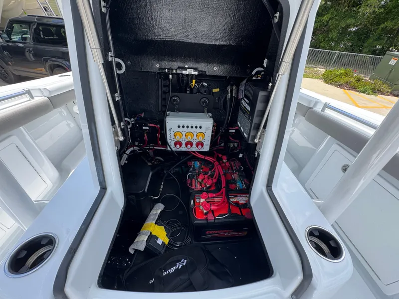 Slide: The Image of 2026 Yellowfin 26 Hybrid boat electrical system and battery compartment. - 24