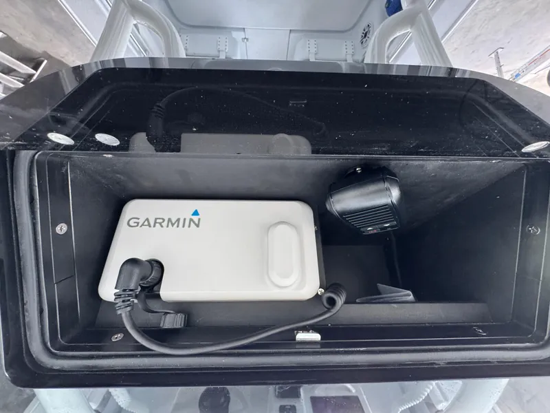 Slide: The Image of Interior of 2026 Yellowfin 26 Hybrid boat with Garmin device installed. - 32