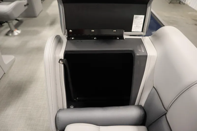 Slide: The Image of 2025 Bentley Pontoons 240 Navigator interior storage compartment with open lid. - 13