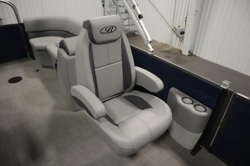 Slide: The Image of Luxurious seating in the 2025 Bentley Pontoons 240 Navigator boat interior. - 29