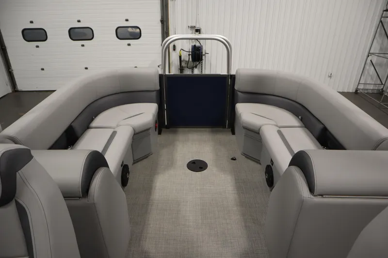 Slide: The Image of 2025 Bentley Pontoons 240 Navigator interior with gray seating and spacious layout. - 30