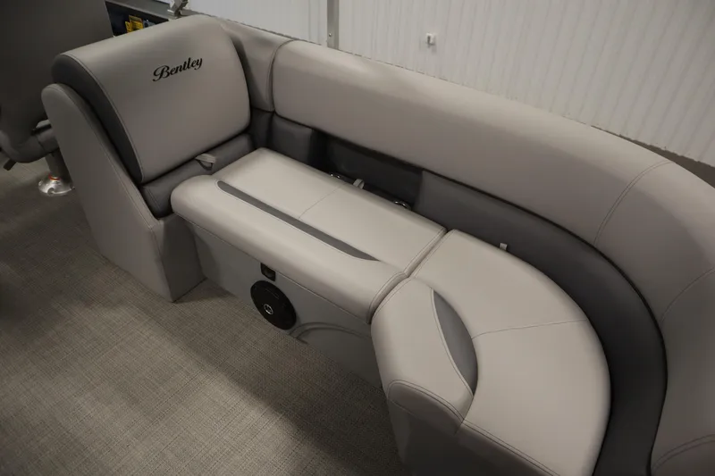 Slide: The Image of 2025 Bentley Pontoons 240 Navigator interior seating, featuring luxurious gray upholstery. - 34