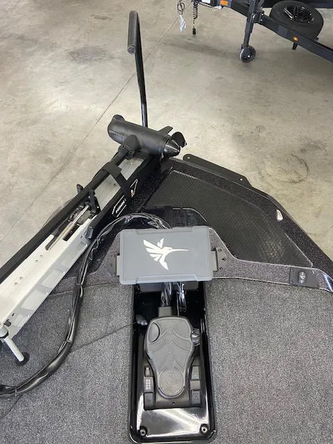 Slide: The Image of 2026 iKon VLX 20 boat interior with advanced control panel and steering mechanism. - 5