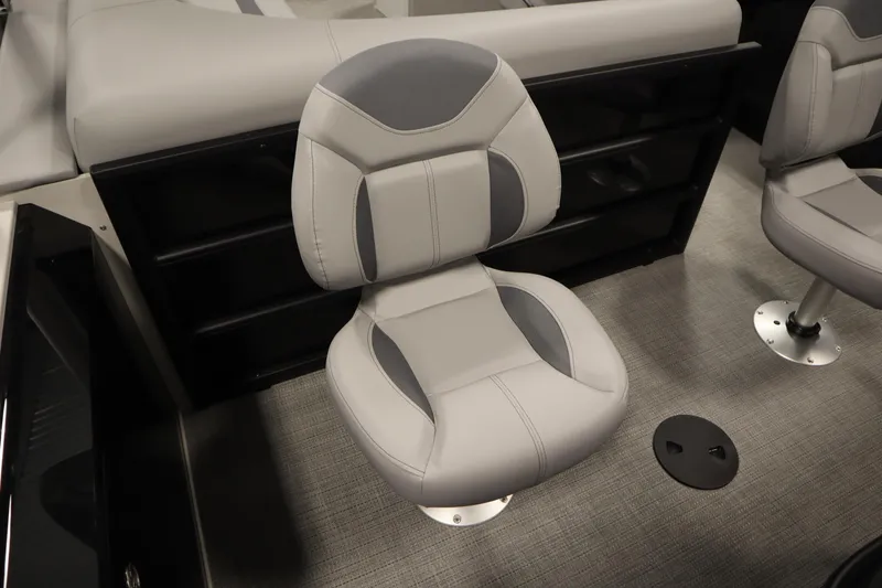Slide: The Image of 2025 Bentley Pontoons 220 Fish-N-Cruise interior with swivel seats and fishing station. - 33