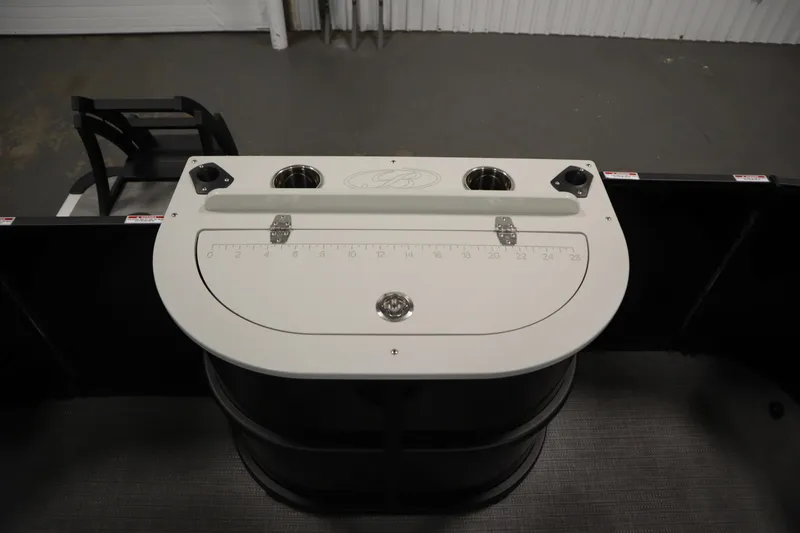 Slide: The Image of 2025 Bentley Pontoons 220 Fish-N-Cruise interior storage compartment with rod holders. - 36
