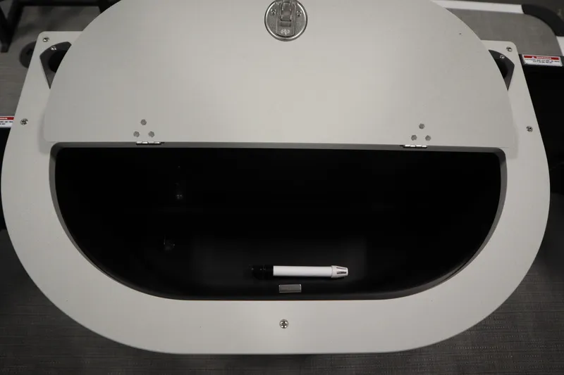 Slide: The Image of Storage compartment of 2025 Bentley Pontoons 220 Fish-N-Cruise with pen inside. - 38