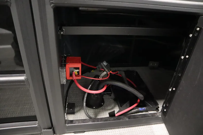 Slide: The Image of Bentley Pontoons 220 Fish-N-Cruise 2025 fishing station with cup holders and measuring guide. - 41