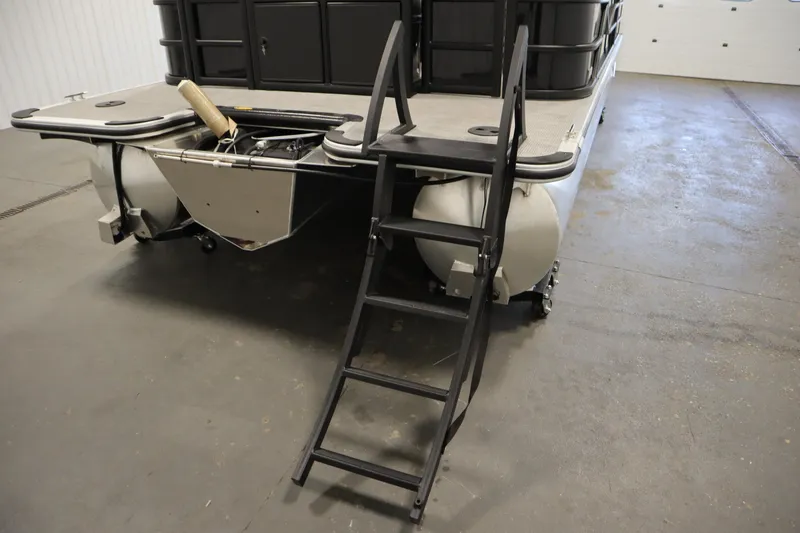 Slide: The Image of 2025 Bentley Pontoons 220 Fish-N-Cruise with rear ladder and motor compartment. - 42