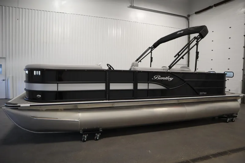 Slide: The Image of 2025 Bentley Pontoons 220 Fish-N-Cruise pontoon boat in showroom, side view. - 8