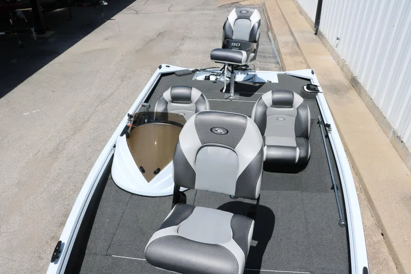 Slide: The Image of 2018 Polar Kraft Bass America TX175 Pro Bass boat with gray seating and spacious deck. - 17