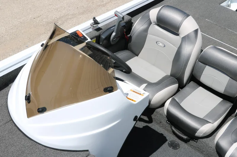 Slide: The Image of 2018 Polar Kraft Bass America TX175 Pro Bass boat interior with steering console and seating. - 20