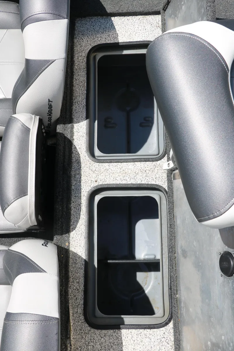 Slide: The Image of 2018 Polar Kraft Bass America TX175 Pro Bass boat interior with storage compartments. - 23