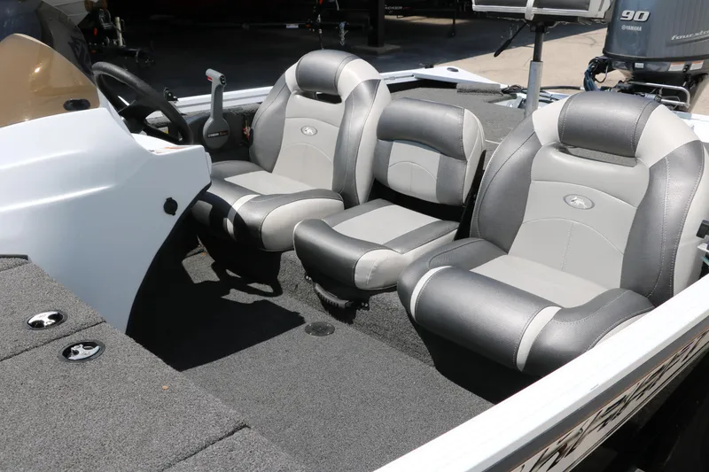 Slide: The Image of 2018 Polar Kraft Bass America TX175 Pro Bass boat interior with gray seating. - 25