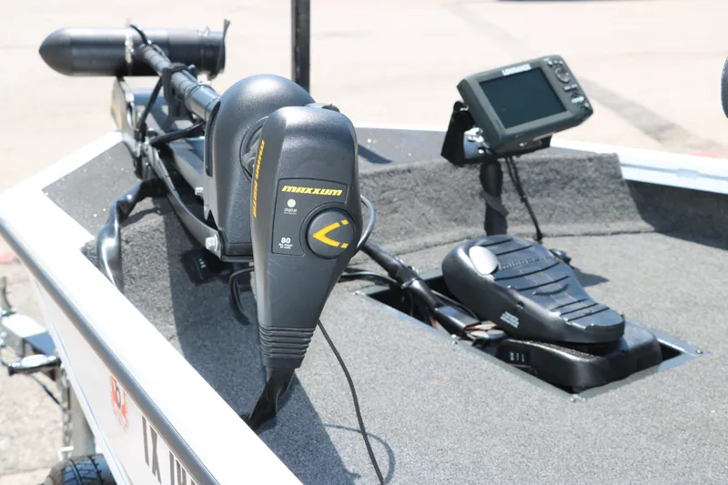 Slide: The Image of 2018 Polar Kraft Bass America TX175 Pro Bass boat with trolling motor and fish finder. - 26