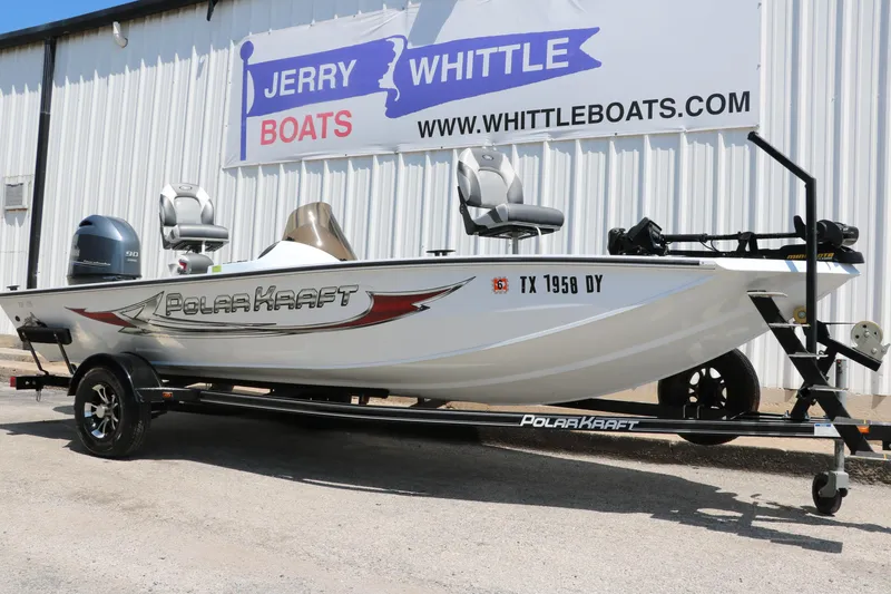Slide: The Image of 2018 Polar Kraft Bass America TX175 Pro Bass boat on trailer outside dealership. - 3