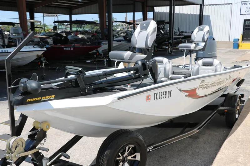 Slide: The Image of 2018 Polar Kraft Bass America TX175 Pro Bass boat on trailer, equipped with Minn Kota motor. - 5
