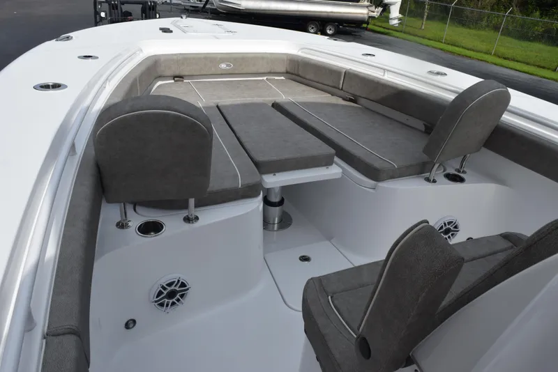 Slide: The Image of 2026 Sea Hunt Gamefish 30 Forward Seating with gray cushioned seats and spacious layout. - 13