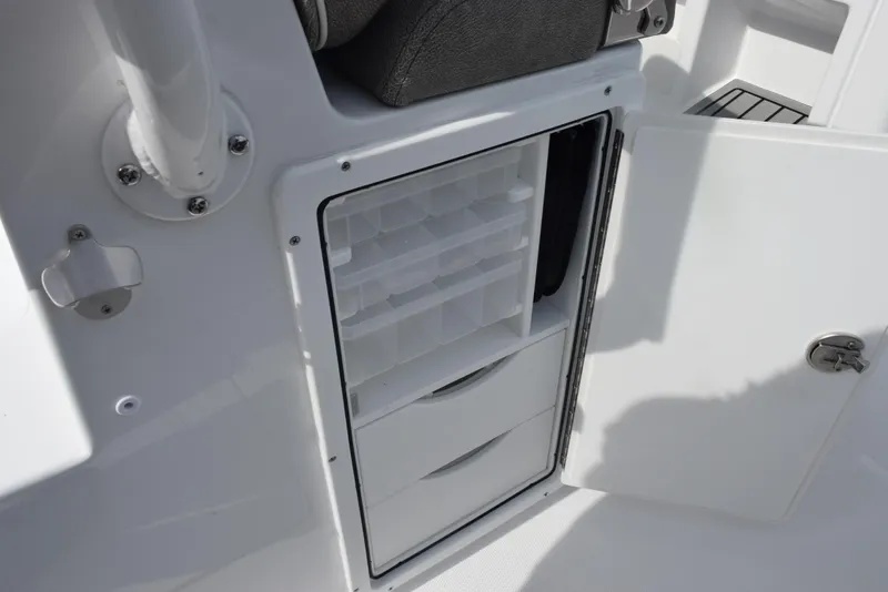 Slide: The Image of Storage compartment on 2026 Sea Hunt Gamefish 30 Forward Seating boat. - 25