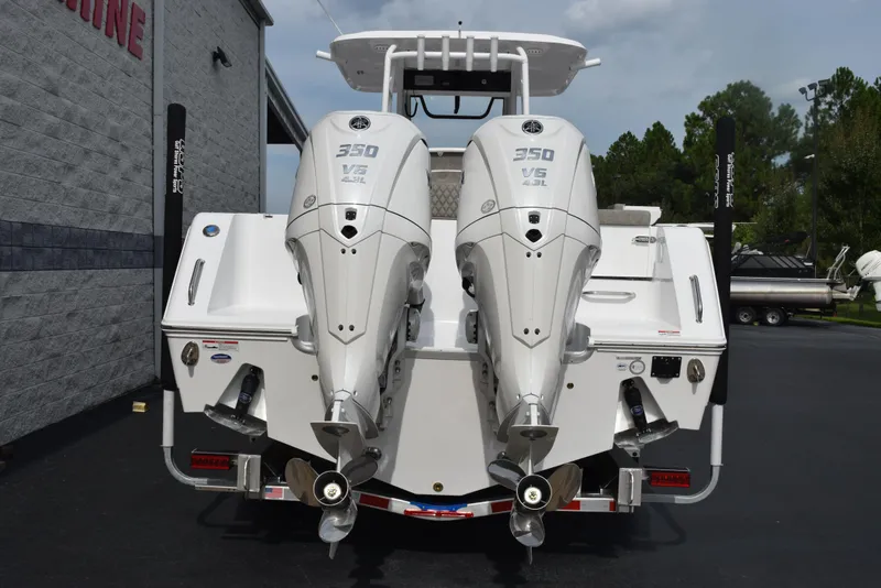 Slide: The Image of 2026 Sea Hunt Gamefish 30 with twin 350 V6 engines, rear view. - 4