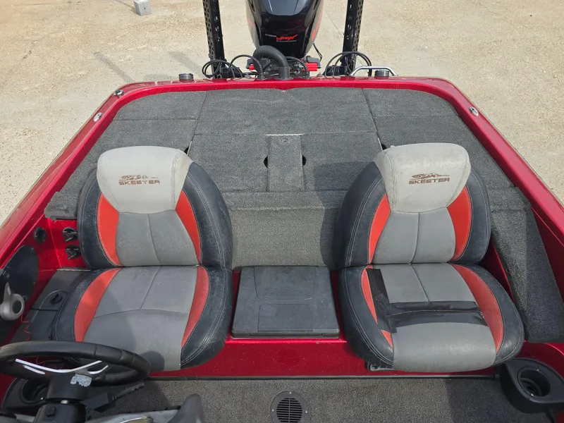 Slide: The Image of 2014 Skeeter ZX 190 boat interior with dual seats and steering wheel. - 10