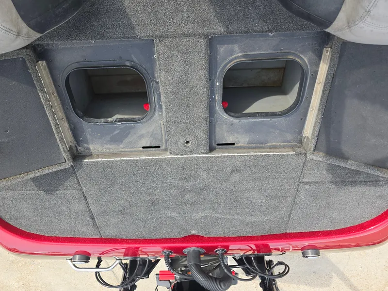 Slide: The Image of 2014 Skeeter ZX 190 boat interior with open storage compartments. - 11