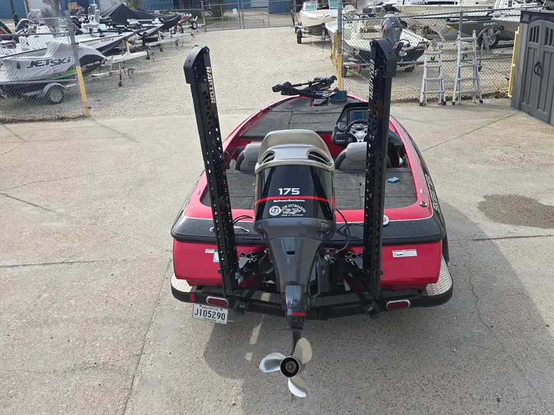 Slide: The Image of 2014 Skeeter ZX 190 boat with 175 horsepower engine, parked in a marina. - 5